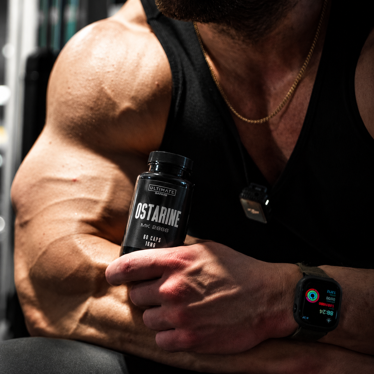Cinematic Bodybuilder Holding Ostarine Bottle